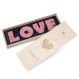 Napis z różowej czekolady - LOVE